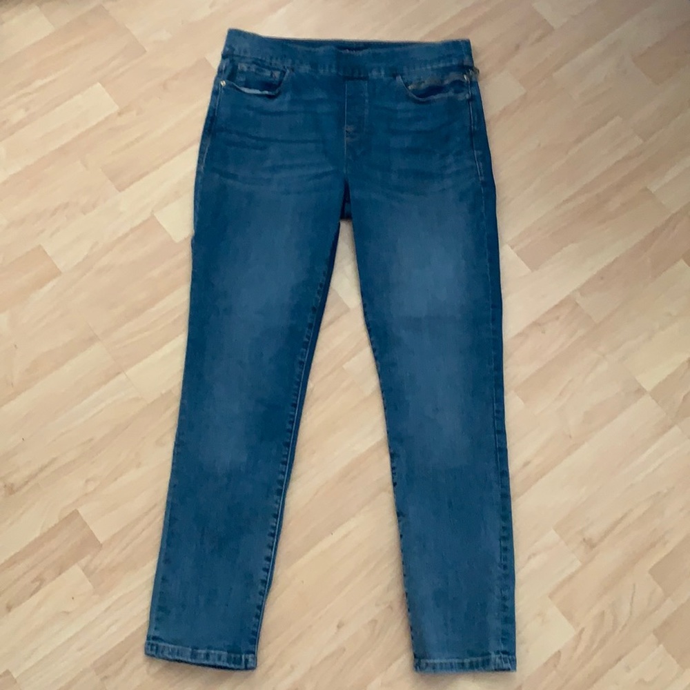No zip, wide band denim jeans.